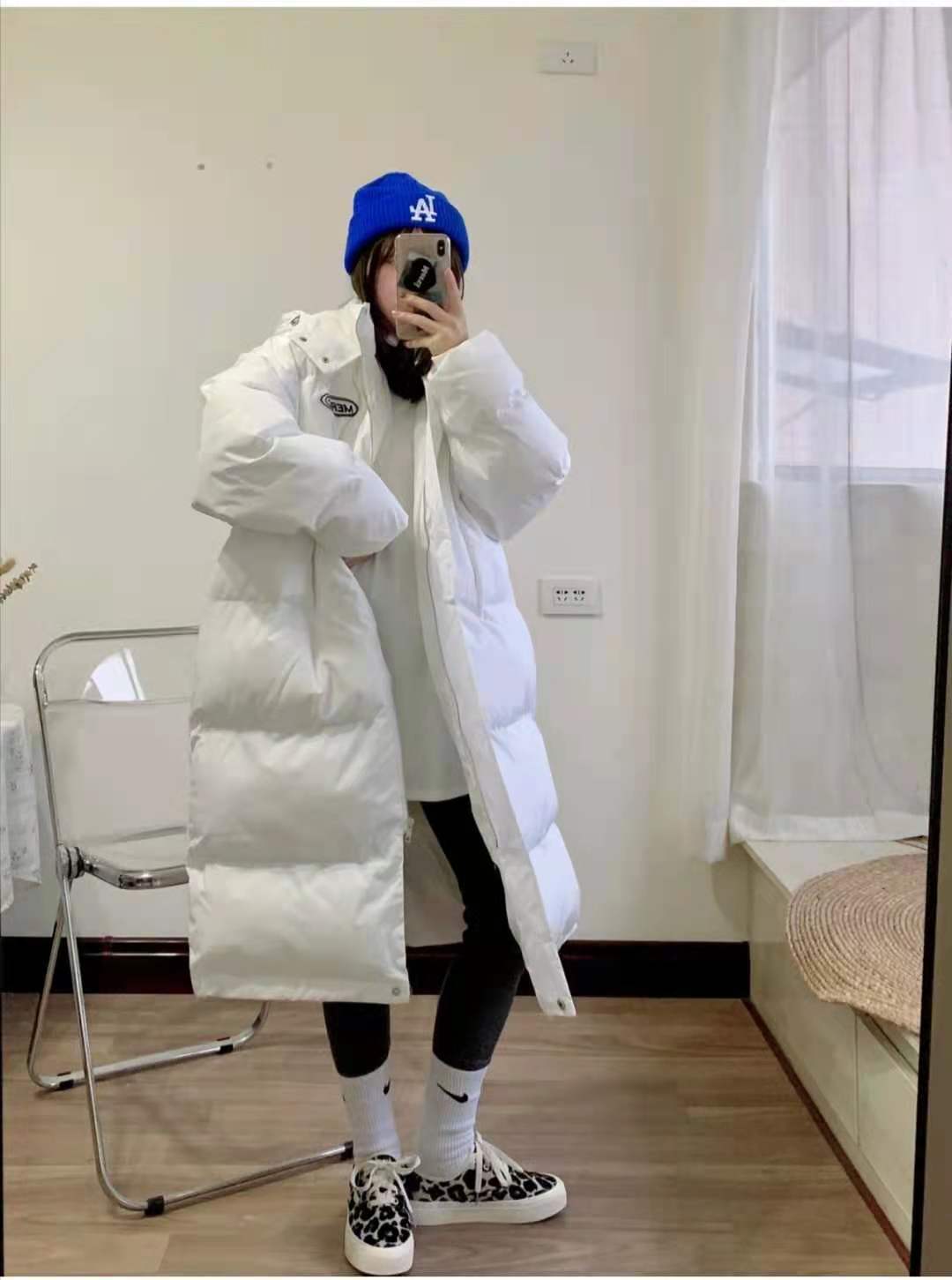 
长款羽绒服搭配什么裤子悦目_华体会体育hth官方网站(图3)